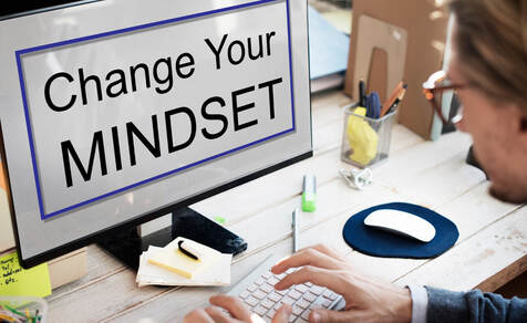 Picture of computer screen that says change your mindset